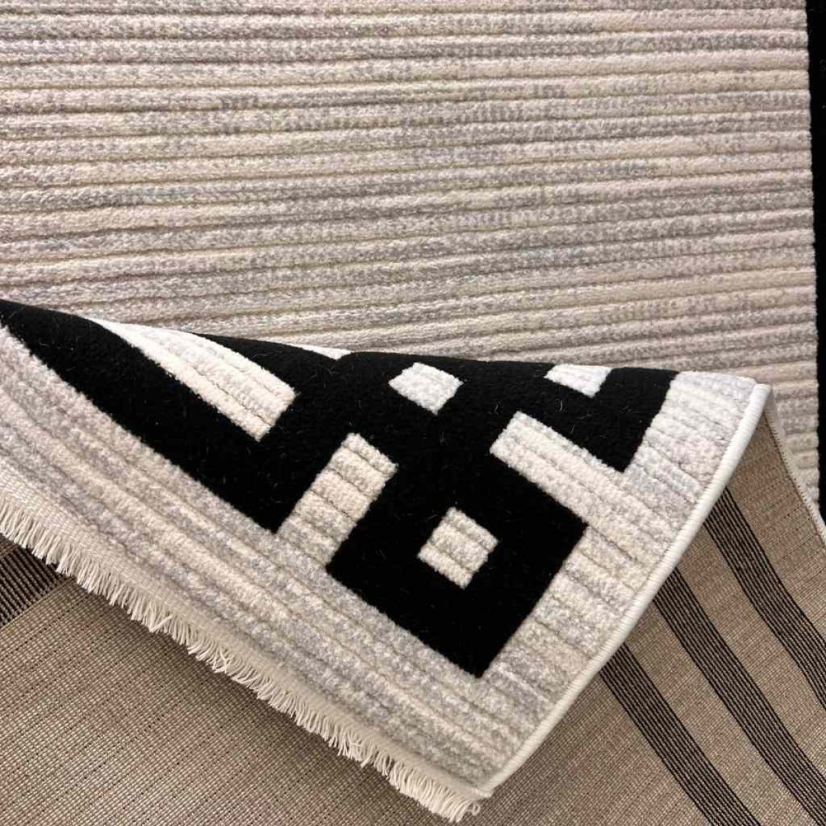سجاد تركي مودرن فندقي لورين F414C كريم اسود مقاس 100*200 سجاد تركي مودرن فندقي لورين F414C كريم اسود مقاس 100*200